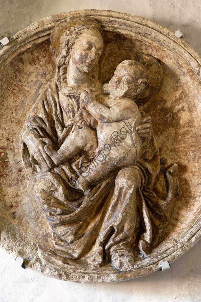 Detail of the fifteenth-century scagliola tondo depicting the Madonna of Humility with Child, niche above door, Contrari Chapel, Vignola Stronghold