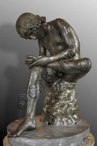 Bronze statue of the Spinario (Boy with a Thorn), Hellenistic sculpture in the Capitoline Museums, Rome