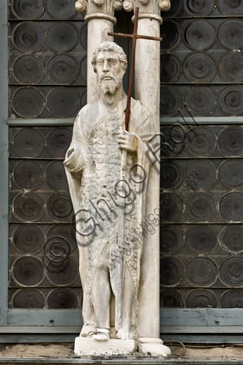 Statue of Saint John the Baptist on the right tower of Genoa Duomo, Gothic sculpture 15th century