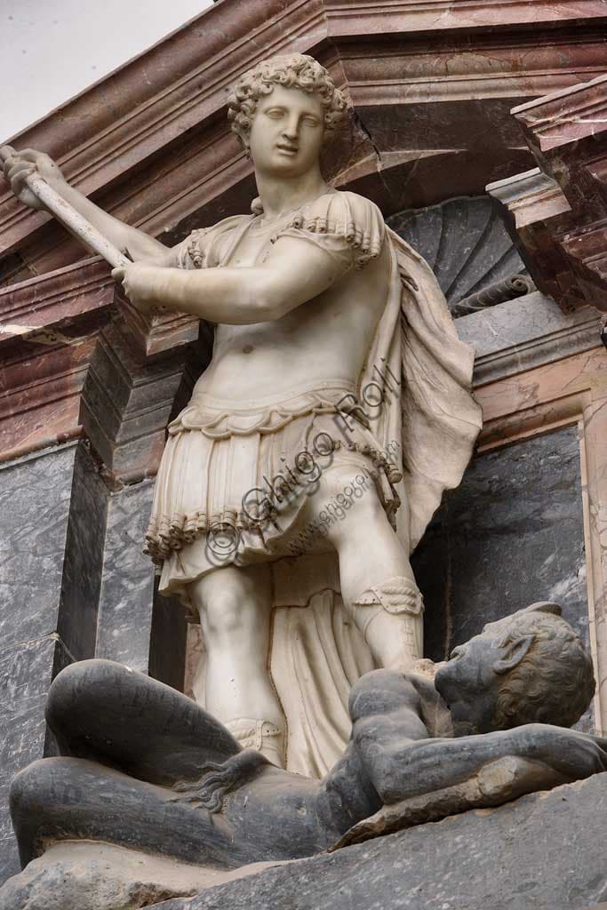 Statue of Saint Michael the Archangel defeating the devil, sculpture by Giovanni Antonio Buzzi in the Mausoleum of Saint Pius V, Basilica of Santa Croce