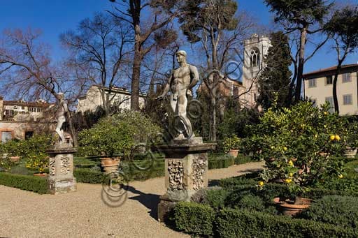 Marble male statue in the historic garden of Palazzo Corsini al Prato in Florence