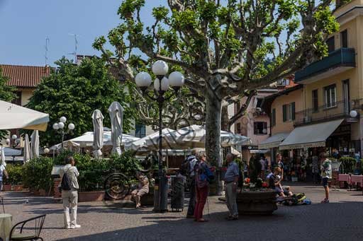 View and glimpse of the main square in Stresa with a panorama of Lake Maggiore in Italy