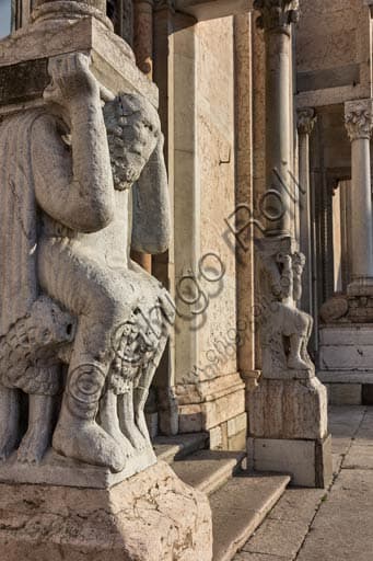 Architectural sculpture of a telamon, left portal, Piacenza Cathedral, Romanesque art