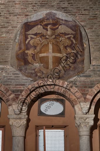 Detail north wall Torresani Hall, Ghirlandina Tower Modena: civic emblem and Este eagle with ducal crown