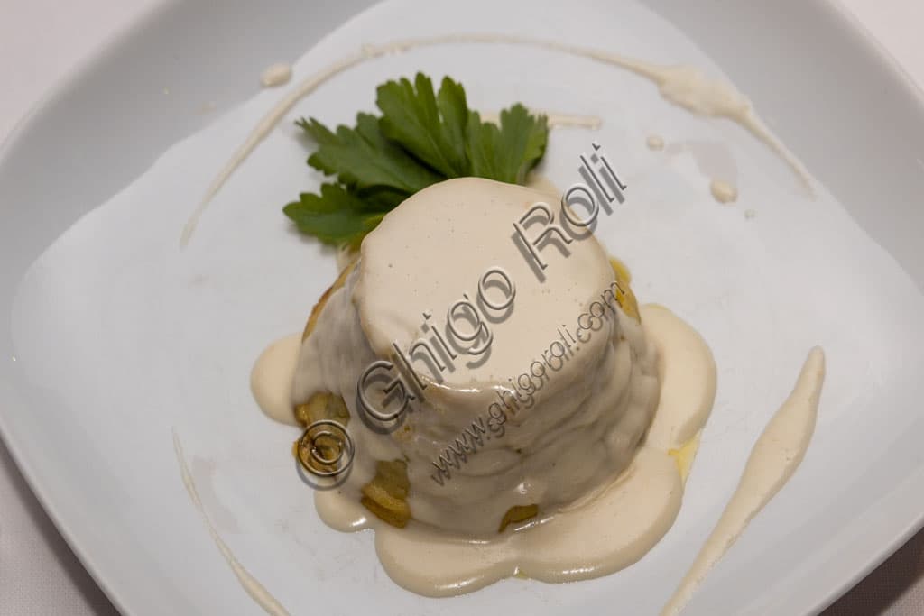 Artichoke appetizer with Parmesan cream served at Trattoria Il Fontanone in Brescia
