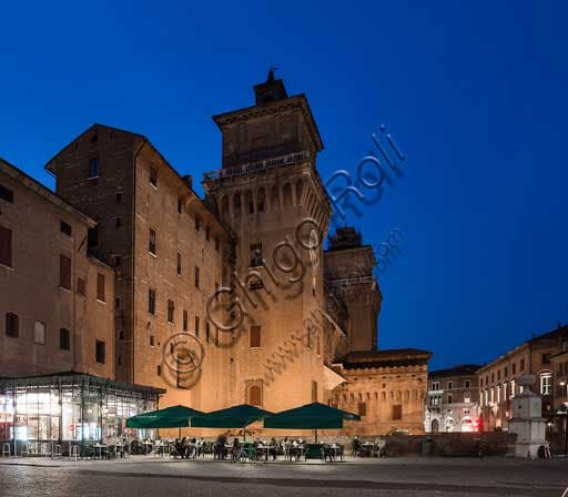 Illuminated night view of the eastern side of the Castello Estense (Castle of St. Michael) in Ferrara