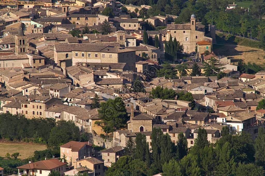 Panoramic view of the medieval village of Bevagna in Umbria, Italy, featuring historic architecture and hilly landscape