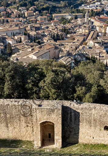 Aerial view of Spoleto from Rocca Albornoz castle showing the historic center, cathedral, and Umbrian hills landscape