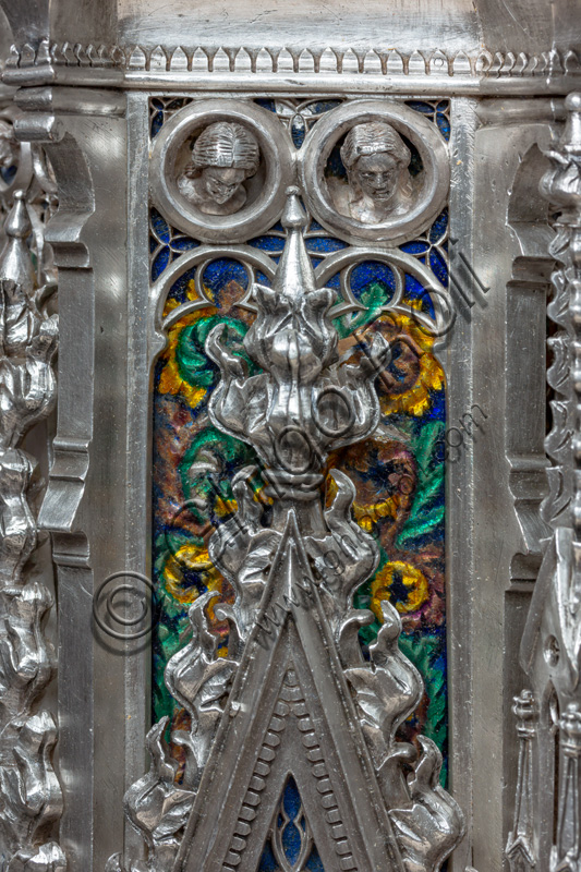 Florence, Museum of the Opera del Duomo (Museum of Florence Cathedral of Santa Maria del Fiore): “the silver altar of St. John's Treasure” (1367 - 1483), by florentine masters.Fourth pillar: detail with enamels and female heads within clypei.