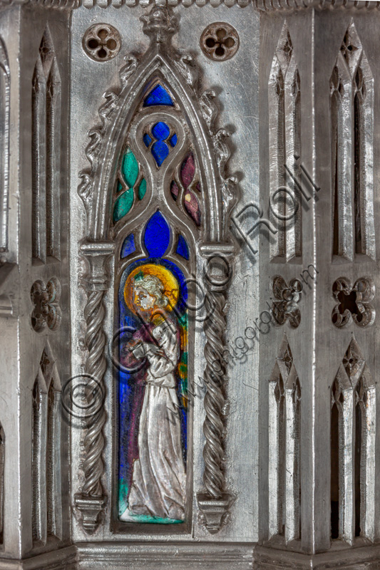 Florence, Museum of the Opera del Duomo (Museum of Florence Cathedral of Santa Maria del Fiore): “the silver altar of St. John's Treasure” (1367 - 1483), by florentine masters.Front of the dossal:  upper detail of an angel in coloured enamels within an ogival window.