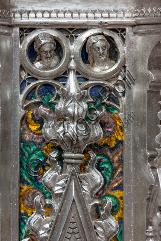 Florence, Museum of the Opera del Duomo (Museum of Florence Cathedral of Santa Maria del Fiore): “the silver altar of St. John's Treasure” (1367 - 1483), by florentine masters.Fourth pillar: detail with enamels and female heads within clypei.