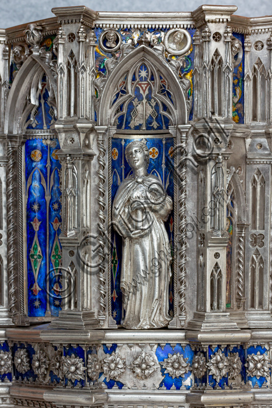 Florence, Museum of the Opera del Duomo (Museum of Florence Cathedral of Santa Maria del Fiore): “the silver altar of St. John's Treasure” (1367 - 1483), by florentine masters.Front of the dossal, left corner pillar: niche with a statue of a saint.