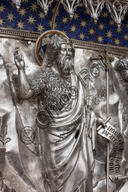 “St John the Baptist preaches to the crowds”, by fourteenth-century Florentine goldsmiths. St. John holds up the motto: "Vos clamantes in the desert, parate viam Domini".Tile of “The Silver Altar of St. John's Treasure” (1367 - 1483), Museum of the Opera del Duomo (Museum of Florence Cathedral of Santa Maria del Fiore), Florence.Detail.