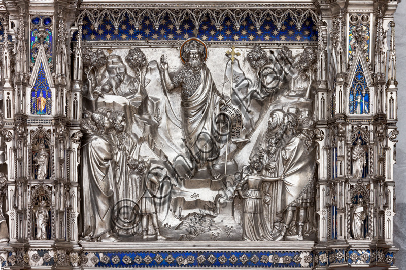 “St John the Baptist preaches to the crowds”, by fourteenth-century Florentine goldsmiths. St. John holds up the motto: "Vos clamantes in the desert, parate viam Domini".Tile of “The Silver Altar of St. John's Treasure” (1367 - 1483), Museum of the Opera del Duomo (Museum of Florence Cathedral of Santa Maria del Fiore), Florence.