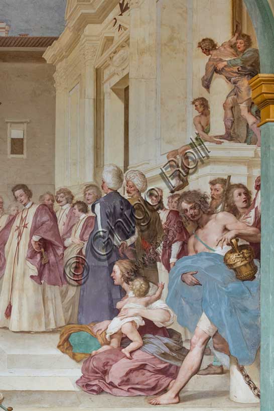 Medici Villa La Petraia, courtyard: “Cosimo II receives the winners of the Bona's feat”, fresco from the cycle of the Fasti Medicei by Volterrano (Baldassarre Franceschini), 1636-1647.Against the background of Piazza dei Cavalieri in Pisa, Cosimo II, still heir to the throne, receives in the churchyard of the church of Santo Stefano dei Cavalieri the Tuscan nobles engaged in a victorious expedition in the battle of Bona, in Algeria, fought between the Genoese and the Turks on 16 September 1608. Among those present are Silvio Piccolomini, Admiral Jacopo Inghirami, the Marquis Fabrizio di Colloredo and other knights, who climbed into the depths. In the foreground we see the prisoners, who are advanced in front of the spoils of war. The chained and bare-chested slaves have their counterpart in the clothed and turbaned prisoners near the prince.Detail.