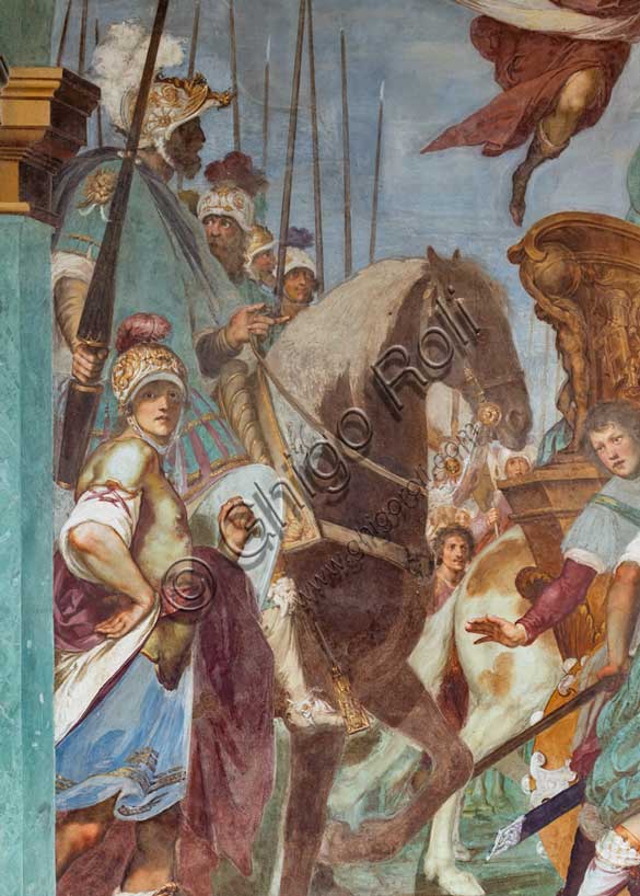 Medici Villa La Petraia, courtyard: “Triumphal entry of Cosimo I into Siena”, fresco from the cycle of the Fasti Medicei by Volterrano (Baldassarre Franceschini), 1636-1647.In 1555 Cosimo I de' Medici conquered Siena with the help of the Imperials, a military feat which later earned him the title of Grand Duke, therefore a crucial moment for the Medici house. The fresco, with clear celebratory intentions, shows Cosimo making his triumphal entry into the city gates on a golden chariot, followed by a large group of dignitaries, welcomed by the Sienese senators and some citizens. Above, a winged Victory crowns him with a laurel wreath.Detail.