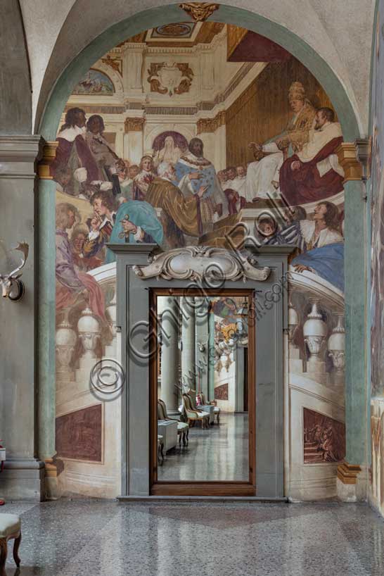 Medici Villa La Petraia, courtyard: “Meeting between Pope Leo”,  fresco from the cycle of the Fasti Medicei by Volterrano (Baldassarre Franceschini), 1636-1647.In 1515 Francis I of France met Pope Leo X in Bologna to clarify the possession of the duchies of Parma and Piacenza.In the centre the King of France Francis I, with the collar of the Order of Saint Michael and the cloak quilted with French lilies, behind which we see a personification in statue of the Ecclesia surmounted by the Medici coat of arms with the keys of Saint Peter and the tiara; finally on the left the group of French dignitaries. Among the prelates Luca Citerni, chaplain of Lorenzo de' Medici (the client),