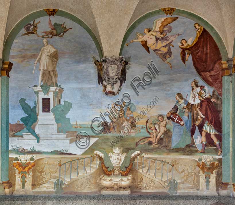 Medici Villa La Petraia, courtyard:“Dominance of Tuscany over the sea”, fresco from the cycle of the Fasti Medicei by Volterrano (Baldassarre Franceschini), 1636-1647.The scene is set in Livorno, the Medici port and ideal city refounded by Francesco I de' Medici and his brother Ferdinand I, in the shadow of the monument of the Four Moors, with the statue of Ferdinand crowned by two winged victories. In the centre, in the background, Neptune's chariot proceeds, with Galatea and Perseus (holding Medusa's shield), to which the sea god points the statue. They sail among a large group of galleys of the Order of Saint Stephen.On the right, in front of a cloth held up by putti in the face and under a personification of Fame, we see the allegories of Tuscany (with the crossed shield), of the Grand Duchy (with crown, scepter and mantle with the crest of the Order) and of Livorno, with the castle coat of arms.